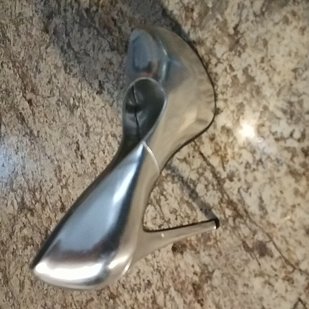 Kiss & Tell Silver Stilettos.